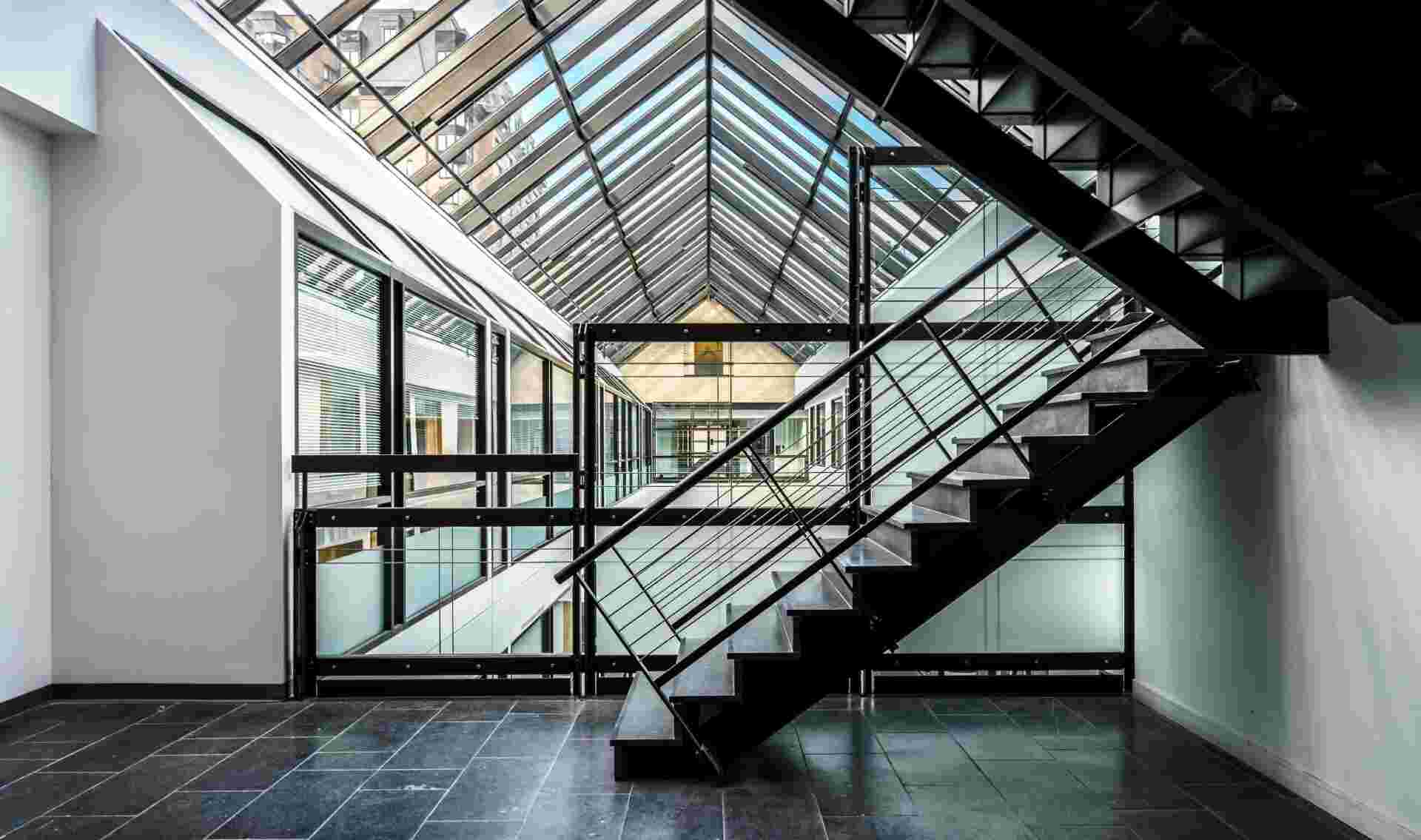 Home 2 - 747-rue-du-square-victoria-interior-staircase