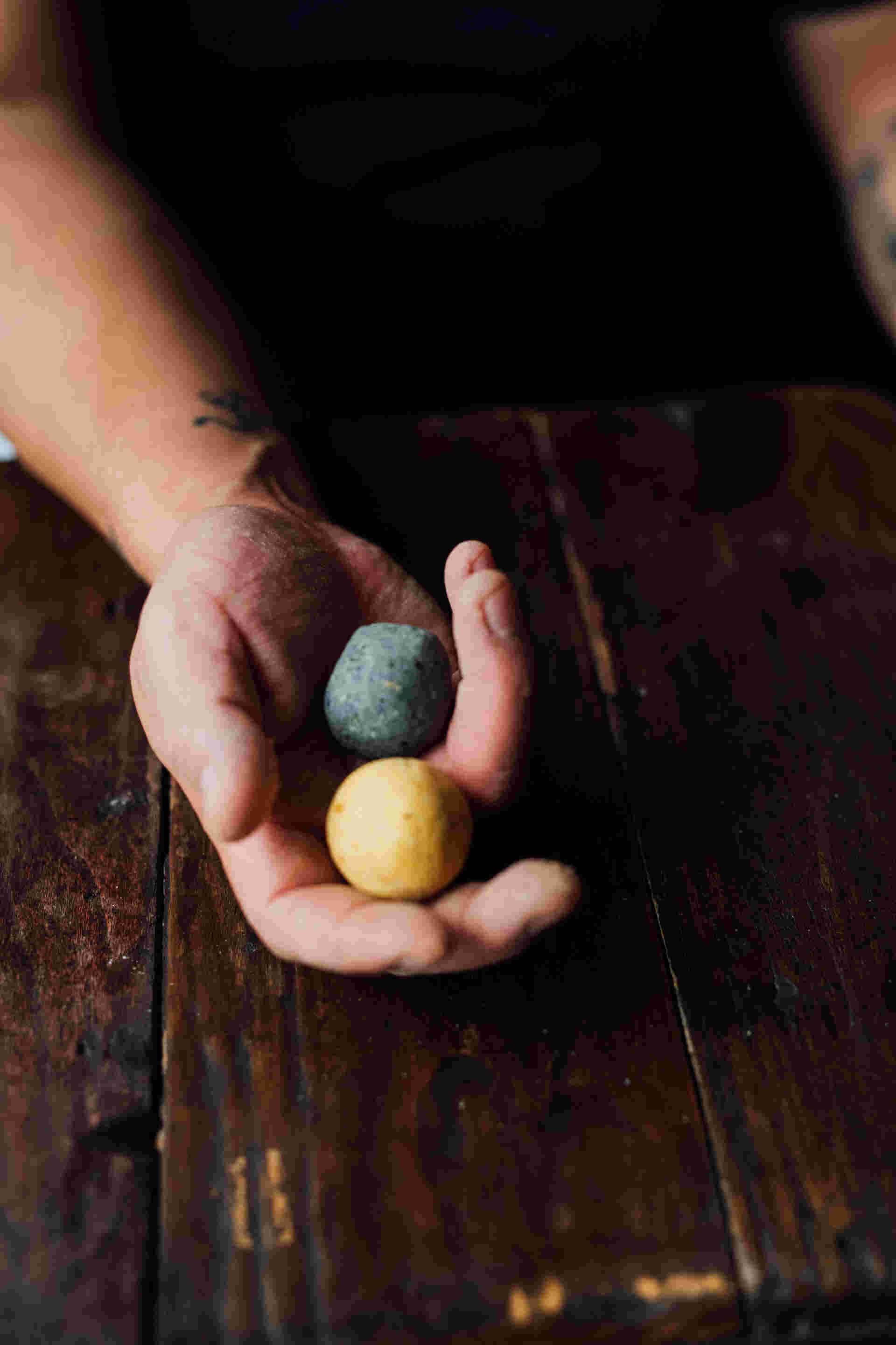 Family Meal - 22-Hand-holding-two-dough-balls-one-blue-and-one-yellow